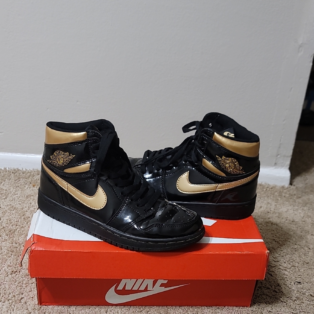 Nike Black and Gold High-Tops